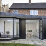 Grey ADU with large sliding glass doors